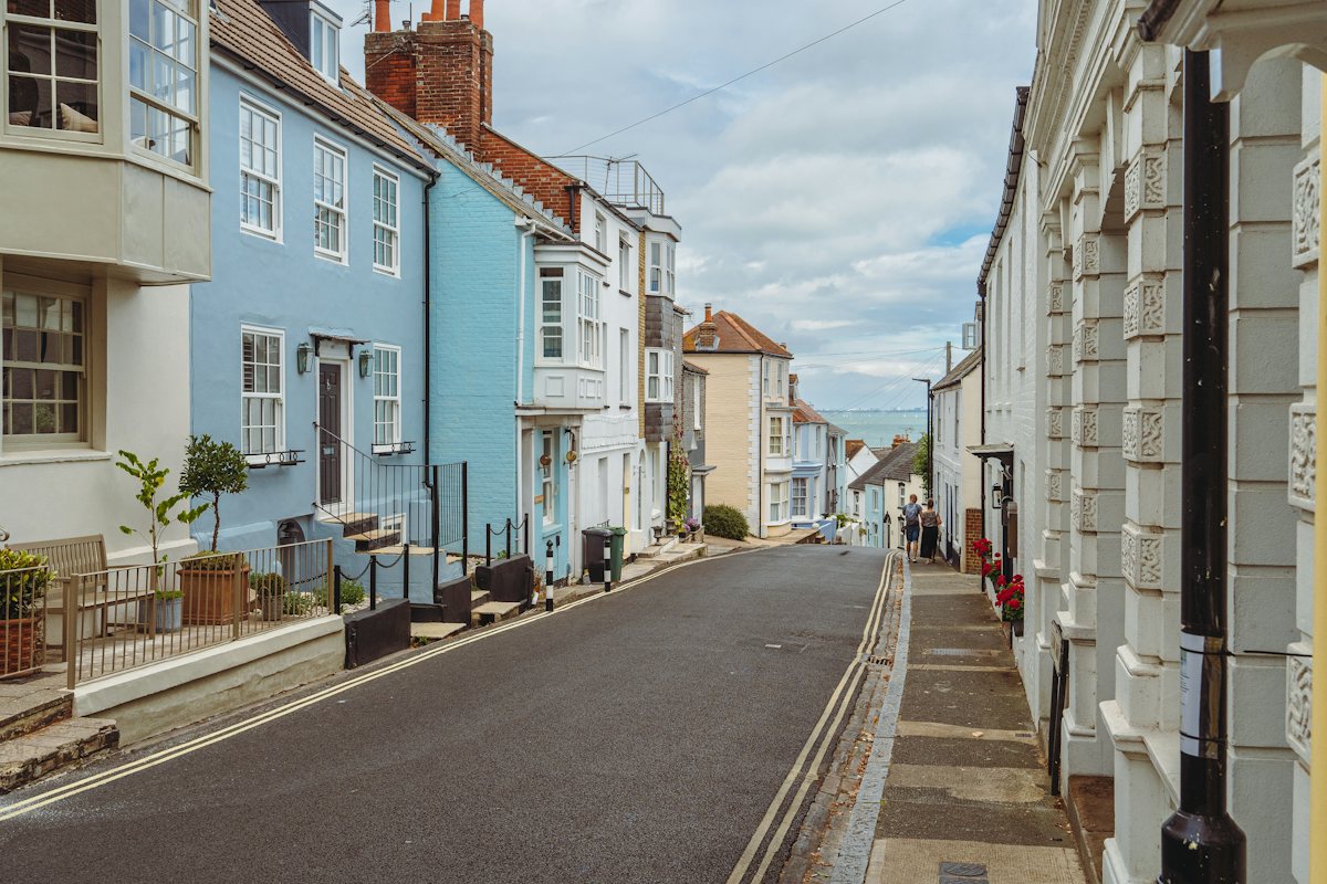A quiet English street of terraced houses